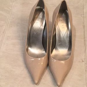 Guess patent leather nude pointy toe heels.